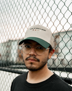 Made In God's Image Dark Green Khaki Trucker Hat